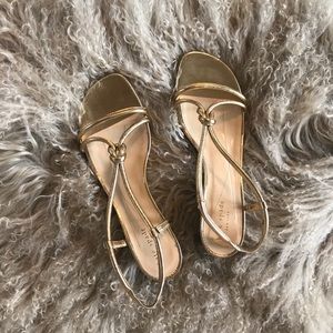 Kate Spade gold strappy wedge heels